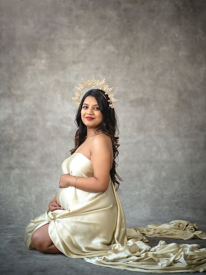 A seated version of the draped silk portrait, offering a look of serene elegance and timeless beauty.