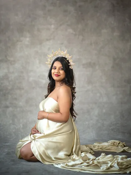 A seated version of the draped silk portrait, offering a look of serene elegance and timeless beauty.