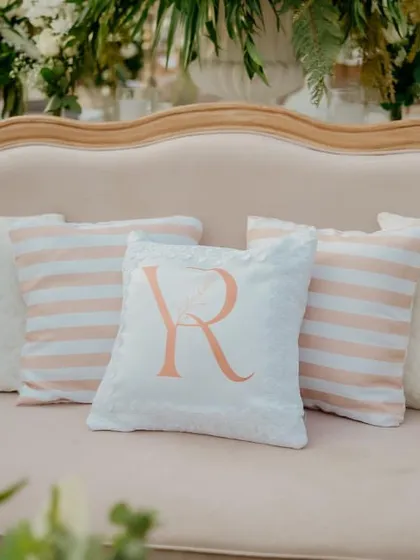 Personalization is key. For the 'Luxe Garden' wedding, we added custom monogrammed pillows to the lounge seating, a small touch that makes the couple feel truly celebrated.