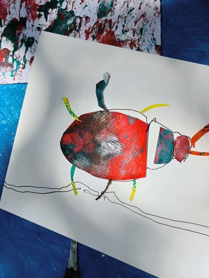 A fantastic beetle collage made by one of the children. We use painted paper and different textures to create art inspired by the beautiful patterns found on insects.