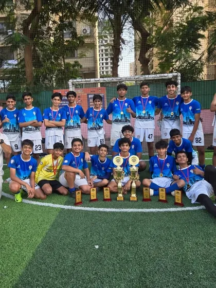 A massive group photo of our winning teams and coaches, showcasing the depth of talent at our academy.