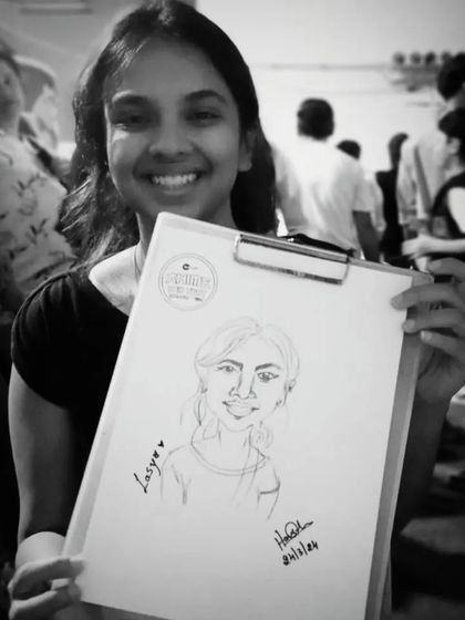 A black and white version of Lasya's portrait, which gives it a classic, timeless feel.