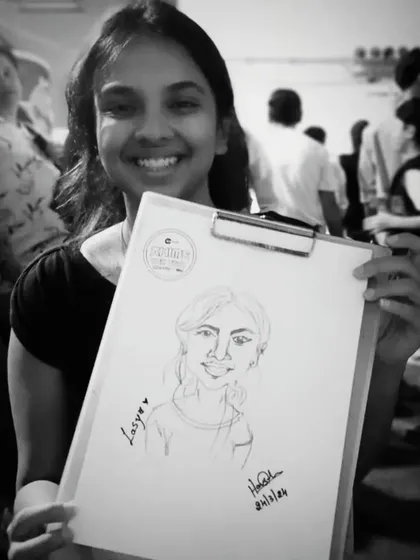 A black and white version of Lasya's portrait, which gives it a classic, timeless feel.