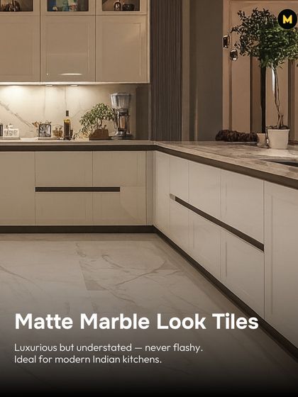 Matte marble-look tiles are luxurious but understated. They are ideal for modern Indian kitchens where you want a touch of elegance that isn't too flashy, providing a clean and sophisticated floor.
