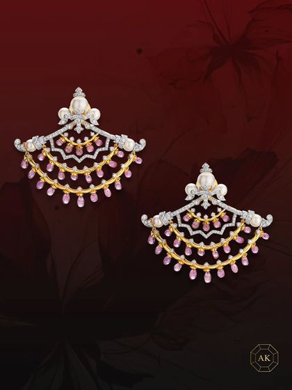 A perfect fusion of modern design and Victorian charm, these earrings are crafted with multi-rows of ruby briolettes, sparkling diamonds, and lustrous South Sea pearls.