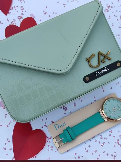 The personalized sling bag and watch combo, featured here in a lovely sea green. The bag can be customized with a name and a charm of your choice.