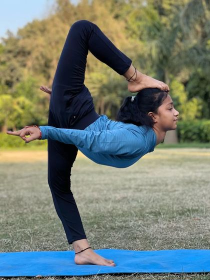 This advanced leg balance pose requires the flexibility of a dancer and the stability of a yogi. We build these skills in every class.