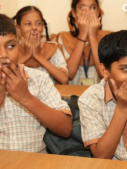 Students learning breath control and vocal techniques in our class at the Akanksha Foundation.