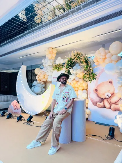 Taking a moment to relax at a beautifully decorated baby shower. The teddy bear and moon theme created a dreamy and adorable atmosphere for the celebration.
