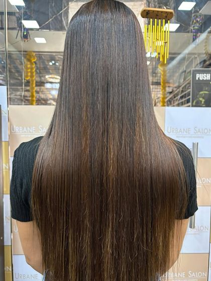 A back view showcasing the flawless finish of the Botoliss treatment. The hair is uniform, glossy, and free of any frizz from root to tip.