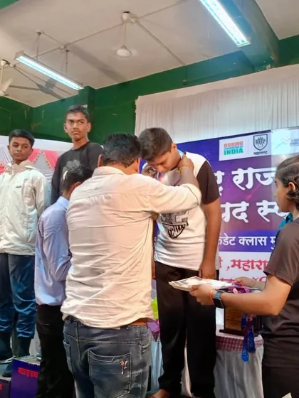 The moment of victory. Zaid Usman receiving his bronze medal at the Maharashtra State Boxing Championship.