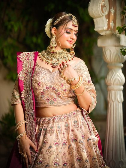 A candid, happy moment. The bride's glowing skin and soft makeup make her look effortlessly beautiful.