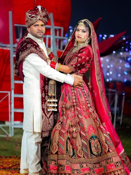 A classic standing portrait of the couple on their wedding day.