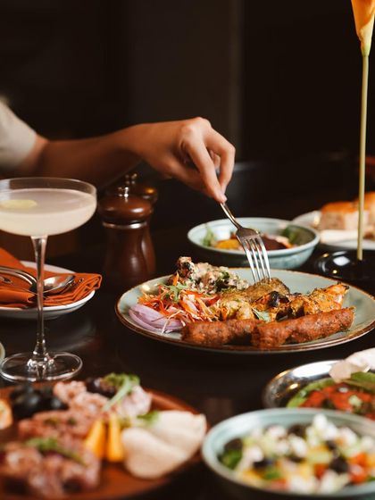 Dig into a plate of succulent kebabs and fresh salads. Our brunch is a hands-on experience, where every bite is a discovery of flavor and texture.