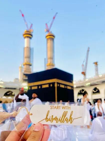 A simple yet meaningful resin bookmark with the phrase "Start with Bismillah" or "End with Alhamdulillah". Photographed at the Kaaba, it’s a small reminder of faith to accompany your reading.