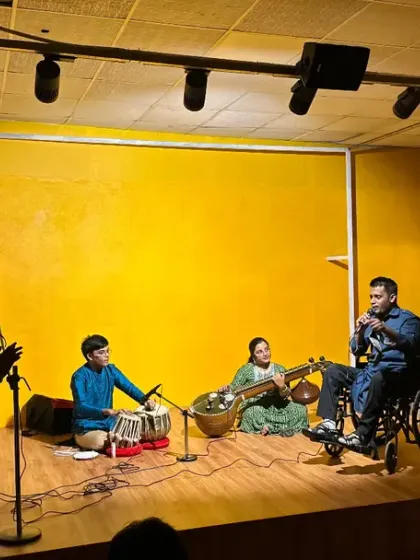 A wider view of the performance stage at Karmasthan. The space is equipped with professional lighting and sound to provide a great experience for both performers and the audience.