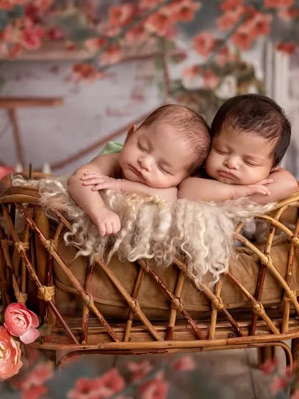Another angle from the floral Bridgerton setup, showing the two babies nestled together peacefully. My studio is filled with props to create these beautiful, story-like scenes.