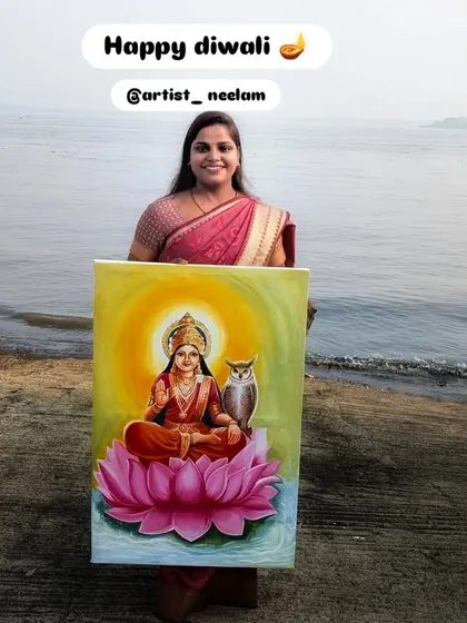 Happy Diwali! Here I am with my painting of Goddess Lakshmi, seated on a lotus. I took this picture by the water to connect the artwork with the natural elements.