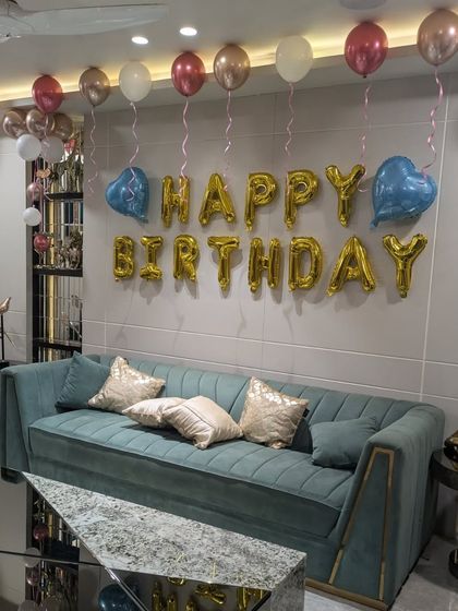 This angle shows the reflection of the balloons in the coffee table, adding to the festive feel of the room.