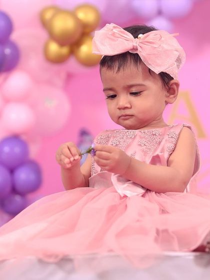 A magical 'Unicorn' themed birthday party, with pastel colors, shimmering backdrops, and unicorn illustrations, creating a whimsical and dreamy atmosphere.