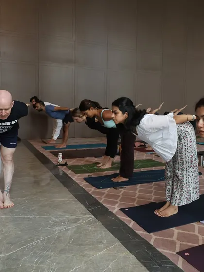 Practicing with my teacher, Eddie Stern. Learning from him is a constant source of inspiration. His guidance has been invaluable in shaping my understanding and teaching of yoga.