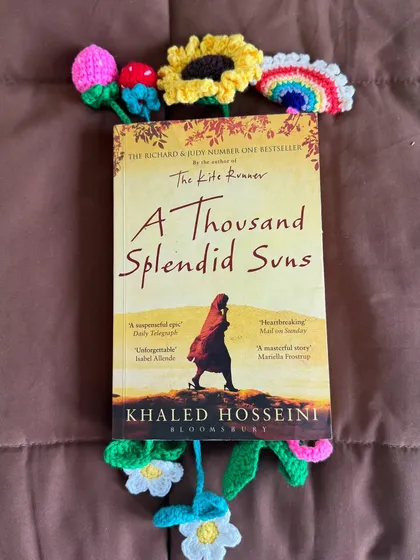 Never lose your page again with our cute floral and rainbow crochet bookmarks. They make reading even more joyful.