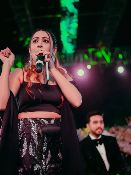 Fully engaged and in command on the Sangeet stage. My expressive style ensures that the audience is always captivated and part of the show.