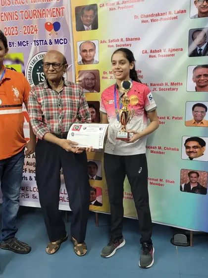 Ananya Chande receiving her silver medal at the 4-Star District Tournament at MCF, Borivali. Her consistent podium finishes are a testament to her hard work.