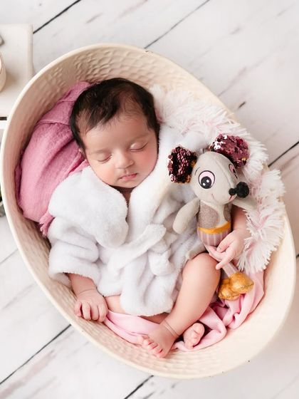 Time for some beauty sleep. Even a simple concept like a baby in a bathrobe holding a little friend can make for an incredibly sweet and memorable photo.