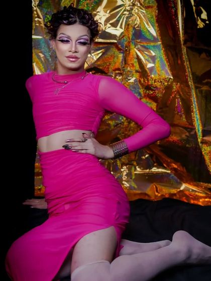 The full look, showcasing the student's ability to create a complete and convincing drag persona.