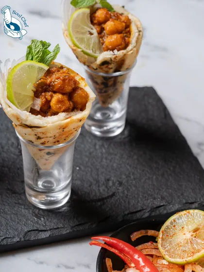 A comforting classic reimagined. These mini Chhole Kulcha cones are a fun and convenient way to enjoy a beloved Indian dish. Served in shot glasses, they are perfect for festive events and large gatherings where guests are mingling.