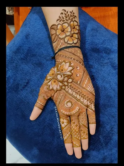 A beautiful Indian henna design with lotus and floral motifs.