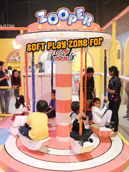 Our soft play zone for kids features a mini carousel, providing gentle fun for toddlers and young children.