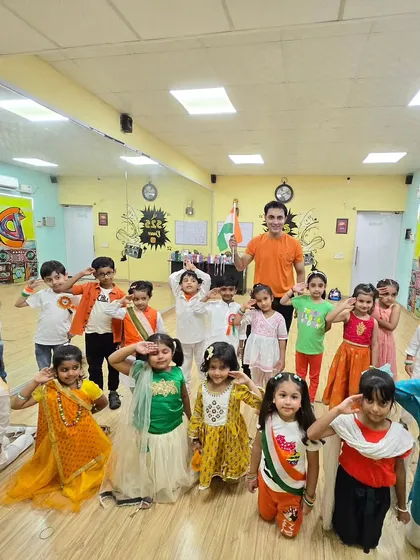 Celebrating Independence Day at the studio. The kids are dressed in tricolor themes, ready to perform a patriotic dance.