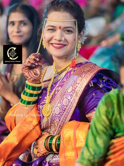 The final stain is just as important as the design itself. This photo, taken at a wedding in Malvan, shows the beautiful, dark colour my fresh, organic mehendi cones produce, complementing the bride's traditional attire.