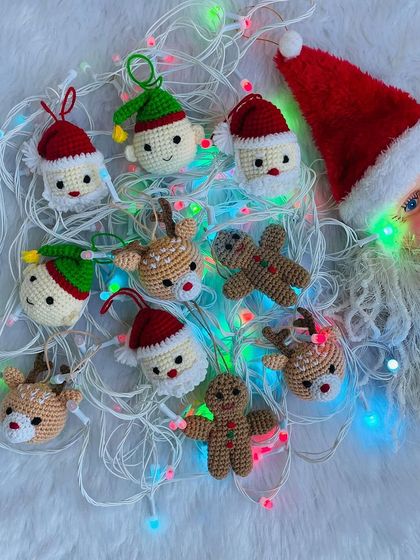 These mini Christmas ornaments are perfect for decorating your tree. The set includes tiny versions of Santa, reindeer, elves, and gingerbread men, all handmade with love.