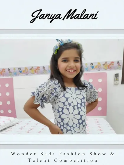 Welcome, Janya Malani. Her bright smile and pretty dress show she's ready to shine.