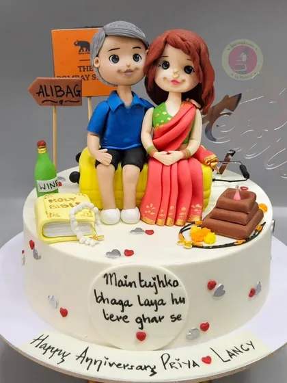 This anniversary cake tells the love story of a couple who eloped 25 years ago, with figurines and details representing their journey.