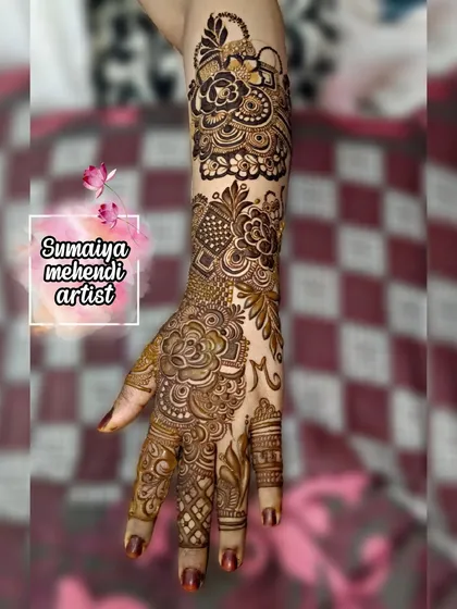 A beautiful design with a mix of floral and geometric elements, including a personalized initial 'M'.