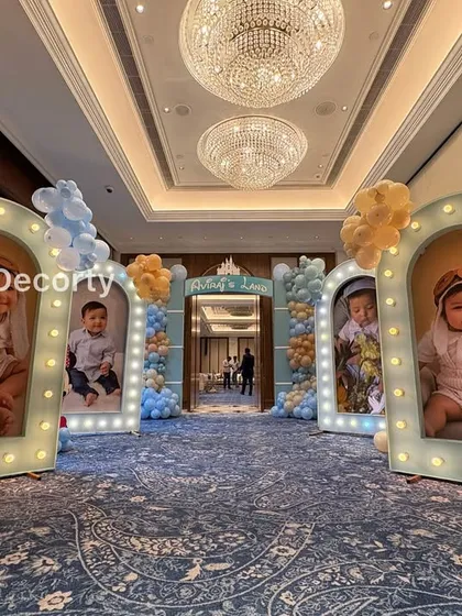 The grand photo gallery entrance, featuring cutouts of Pluto and Donald Duck to welcome guests.