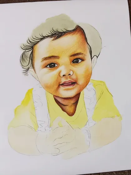 Another work-in-progress photo of the baby sketch, showing the hair being filled in. This stage is crucial for creating a realistic texture.