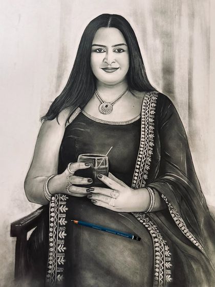 The completed pencil portrait, with the pencil resting on the artwork to show the scale and medium used.