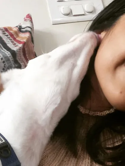 Getting selfies with a puppy is a lesson in patience and a whole lot of kisses. Working with puppies is about embracing their playful energy while gently guiding them on how to interact appropriately.