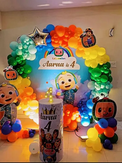 Look how bright and colorful this Cocomelon theme decoration is. I use a rainbow balloon arch and life-size cutouts of JJ and his friends to make the party feel just like the show.