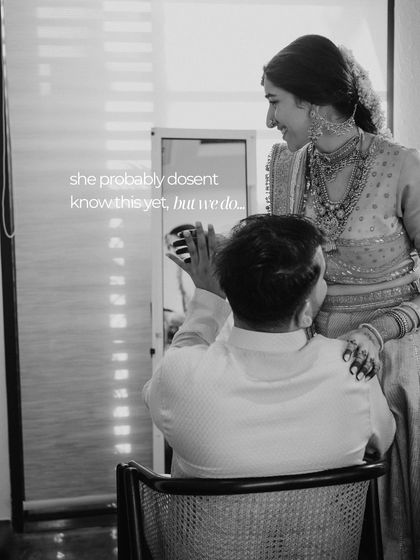 A candid black and white shot of the bride and her father, a reminder that we care for the entire family's look.