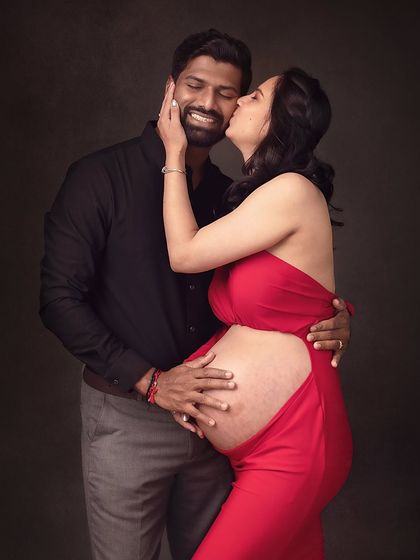 A playful and loving kiss. This image captures the fun and passionate side of their relationship during this special time.
