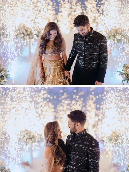 A magical moment as the couple exchanges rings, framed by a backdrop of sparkling cold pyrotechnics.