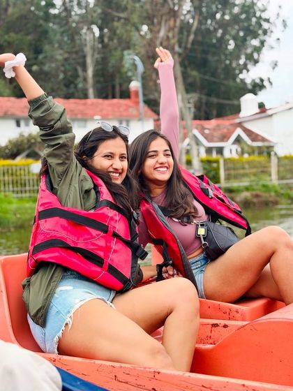 Pure joy while boating on the iconic Kodaikanal Lake. It's a relaxing activity that offers beautiful views of the surrounding hills.