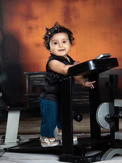 Another shot of our gym girl, looking happy and confident on the treadmill.