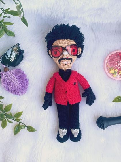 A replica doll of the music superstar, The Weeknd. This was a complex project, from his signature red jacket to his hairstyle and sunglasses, but I'm so proud of how this celebrity replica turned out.